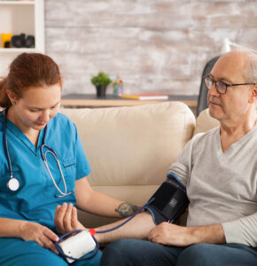 carer-taking-blood-pressure-1200x1000 carer-taking-blood-pressure-1200x1000